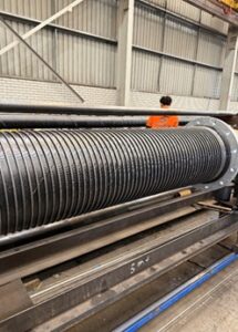 Applied wire helix during hose construction